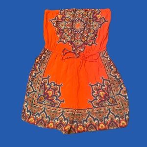 I am giving away another cute romper that is soft and includes cool designs.